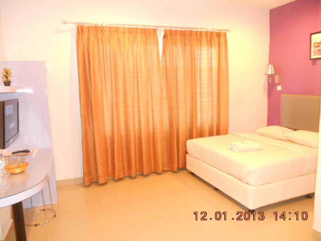 Parma Panam Hotel Pekanbaru Room photo