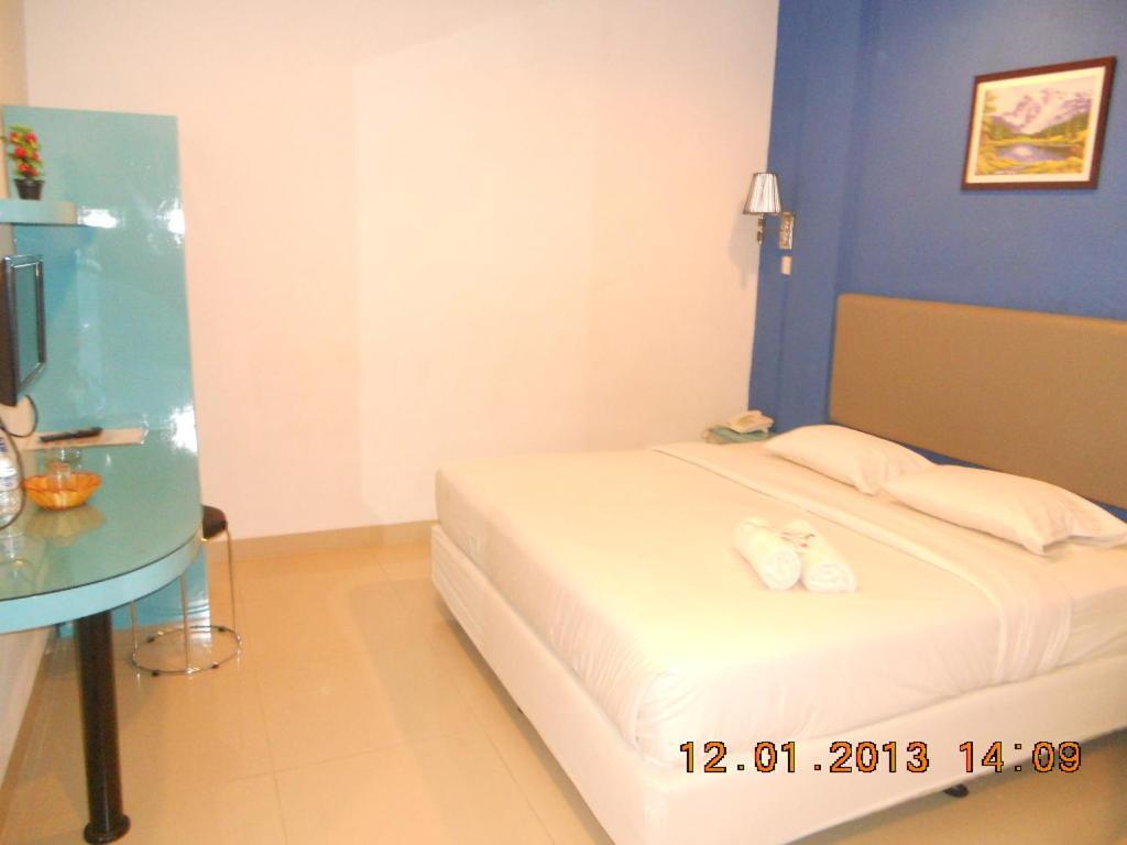 Parma Panam Hotel Pekanbaru Room photo