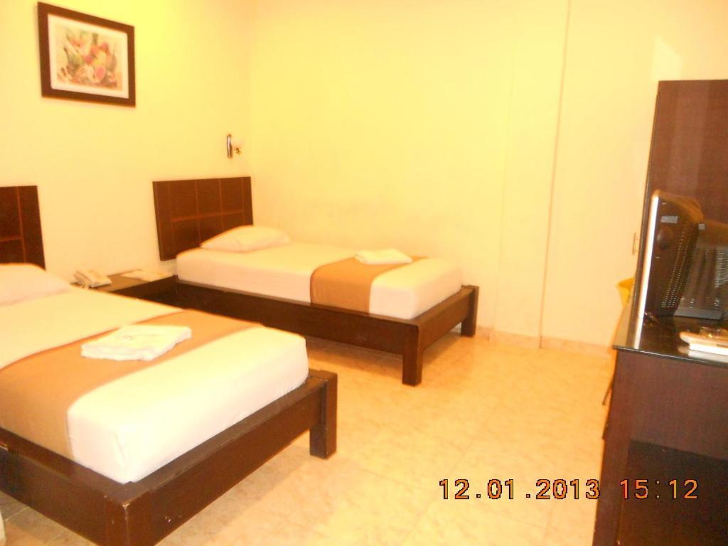 Parma Panam Hotel Pekanbaru Room photo